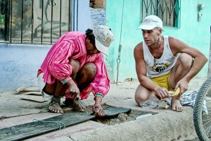 "Barefoot Ted," and Miguel Luna making a pair of Huaraches for Ted in Mexico