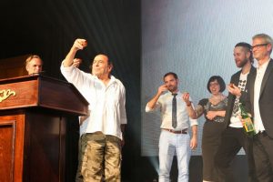 Ron Cooper salutes the crowd at Tales of The Cocktail Spirits Awards